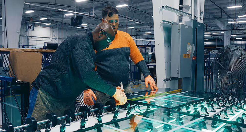 Windows USA factory floor, measuring a custom window